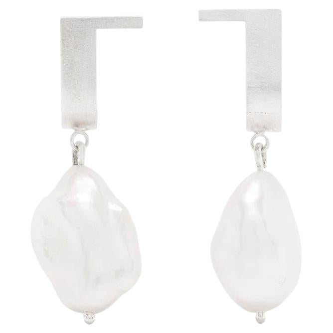 Boucles d'oreilles en argent sterling avec perles d'eau douce en forme de courbe en vente