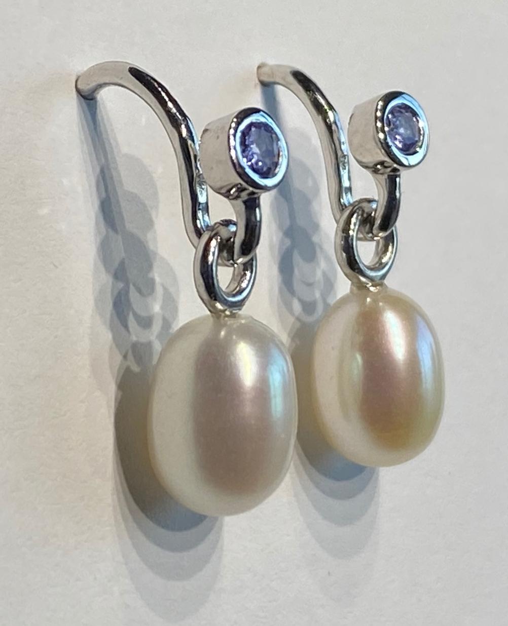 A Pair of Pearl Dangle Earrings Accented with Tanzanites. For Sale 3