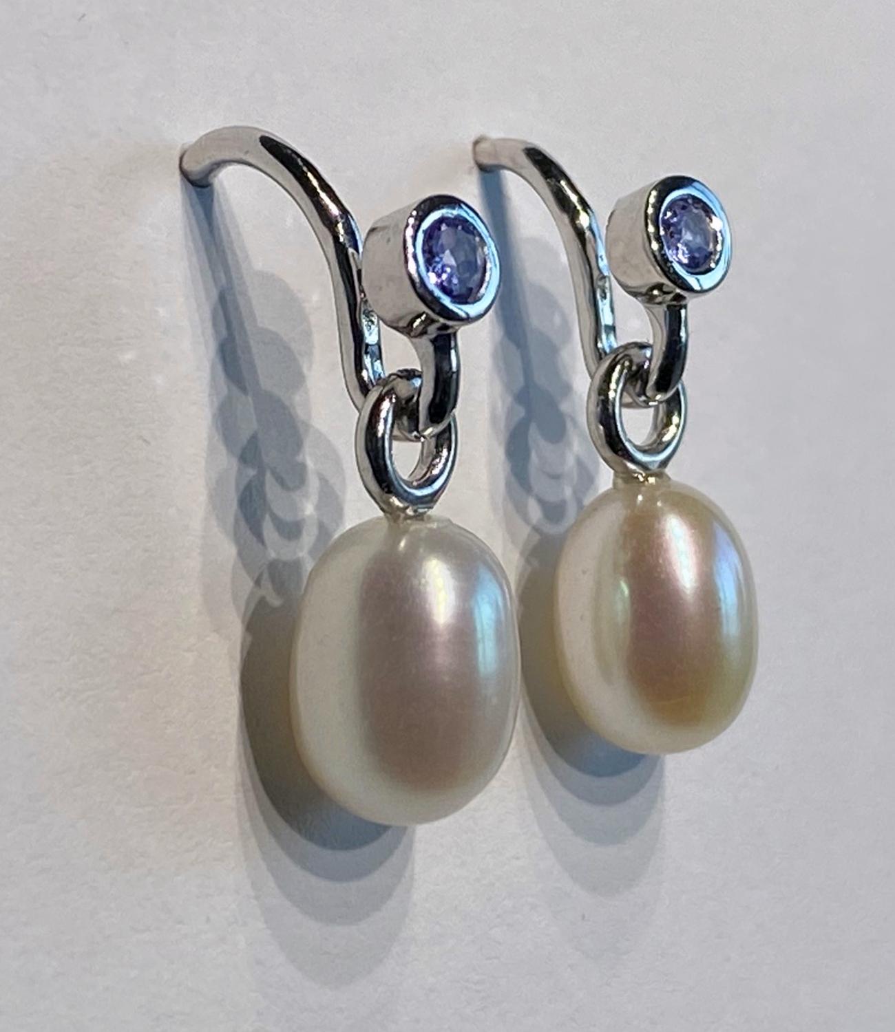 A Pair of Pearl Dangle Earrings Accented with Tanzanites. In New Condition For Sale In Seattle, WA