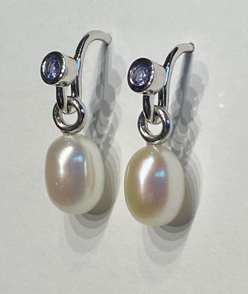 A Pair of Pearl Dangle Earrings Accented with Tanzanites. For Sale 2