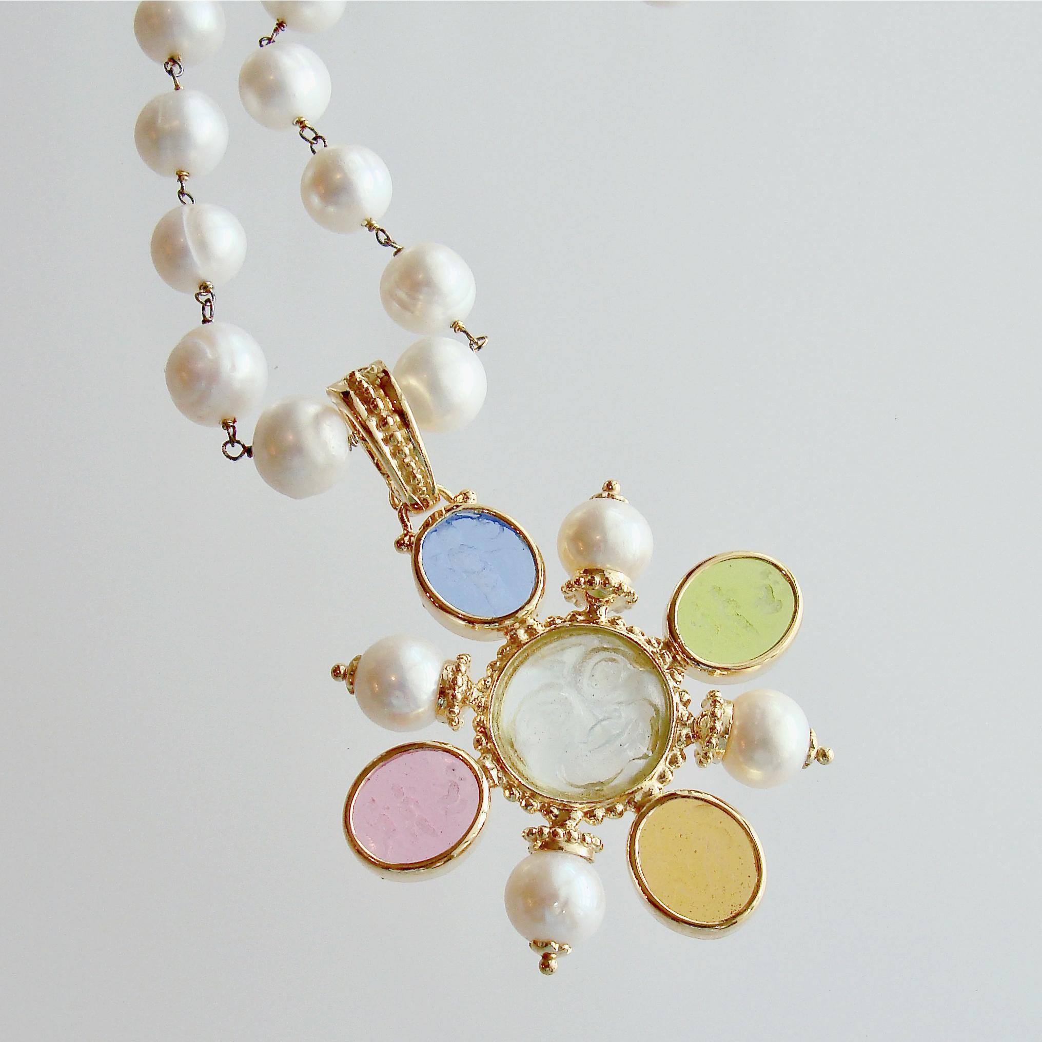 Basiglio Necklace.

This jaw dropping Venetian glass intaglio necklace, in a rainbow of stunning pastels, has been discreetly married to a simple freshwater pearl chain to echo the luxe and wealthy style of the Basiglio area of Italy.  Perfect for