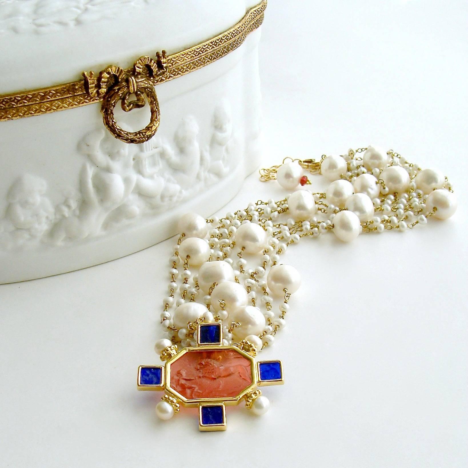 The elegant beauty of simple strands of hand-linked creamy satin pearls, intercepted by larger baroque pearls, is the perfect compliment to this neoclassical salmon pink and cobalt blue Venetian glass cameo/intaglio pendant, accented with creamy
