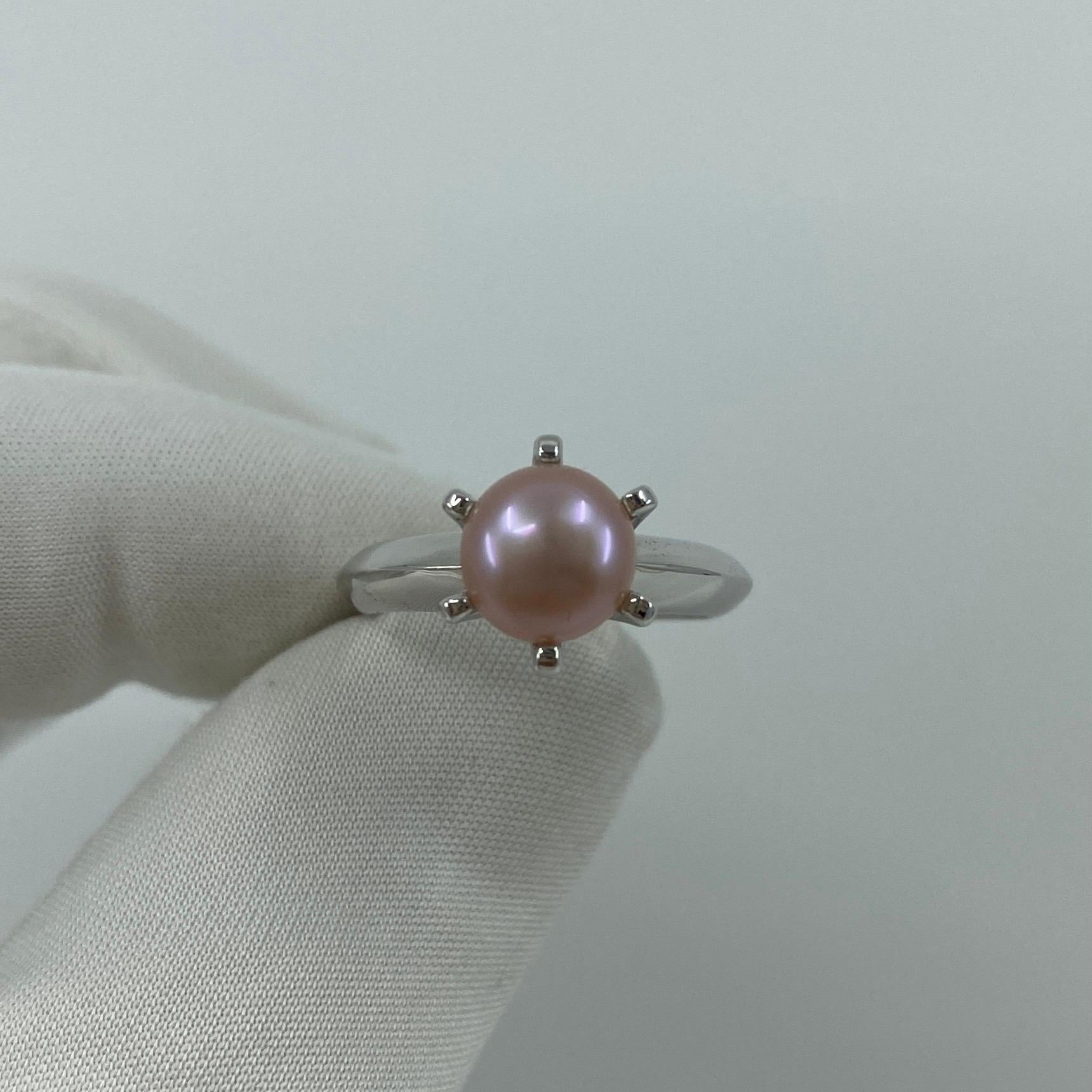 Freshwater Pink Pearl Silver Solitaire Ring.

Fine 7.7mm cultured pink pearl set in a beautiful 6 prong sterling silver solitaire ring. Excellent polish on the ring and the pearl is also excellent quality in top condition.

Ring size M. The ring is