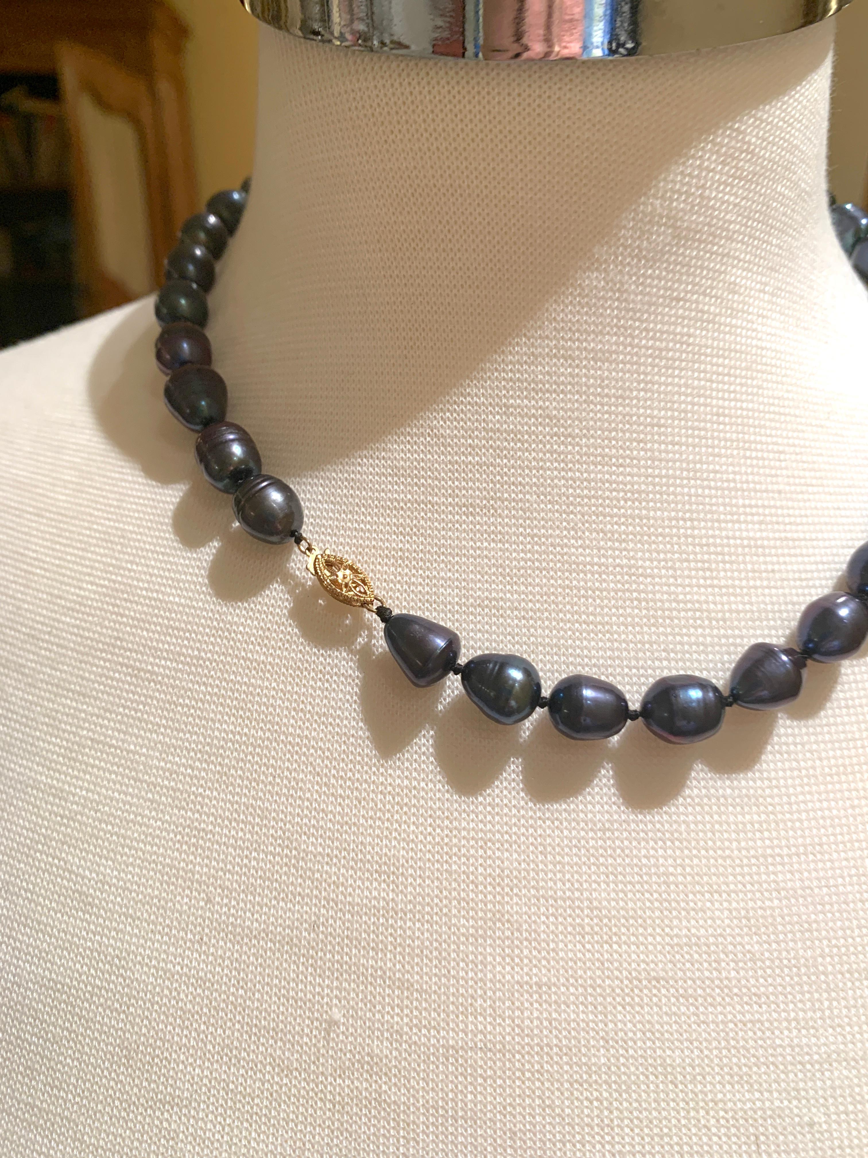Hand Knotted 14Kt Gold clasp Freshwater Tahitian Baroque Pearl Necklace.  Lovely Luster can be layered or worn alone. 12 mm pearls.