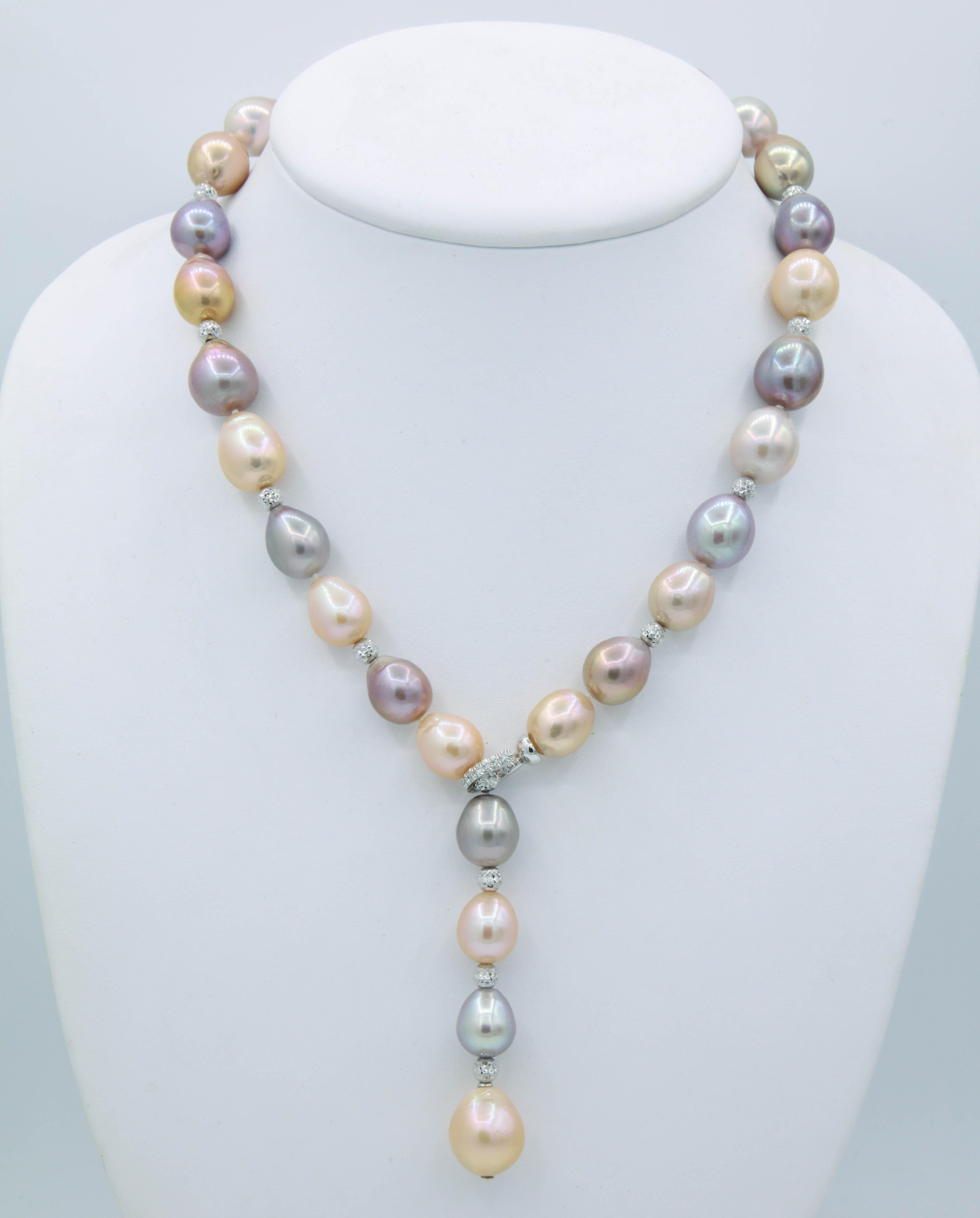 Freshwater cultured pearl 11.5 mm - 14.0 mm  peach , pink and purple color
30 Pearls
18K white gold cut like Diamond cut to give that special diamond effect.
20