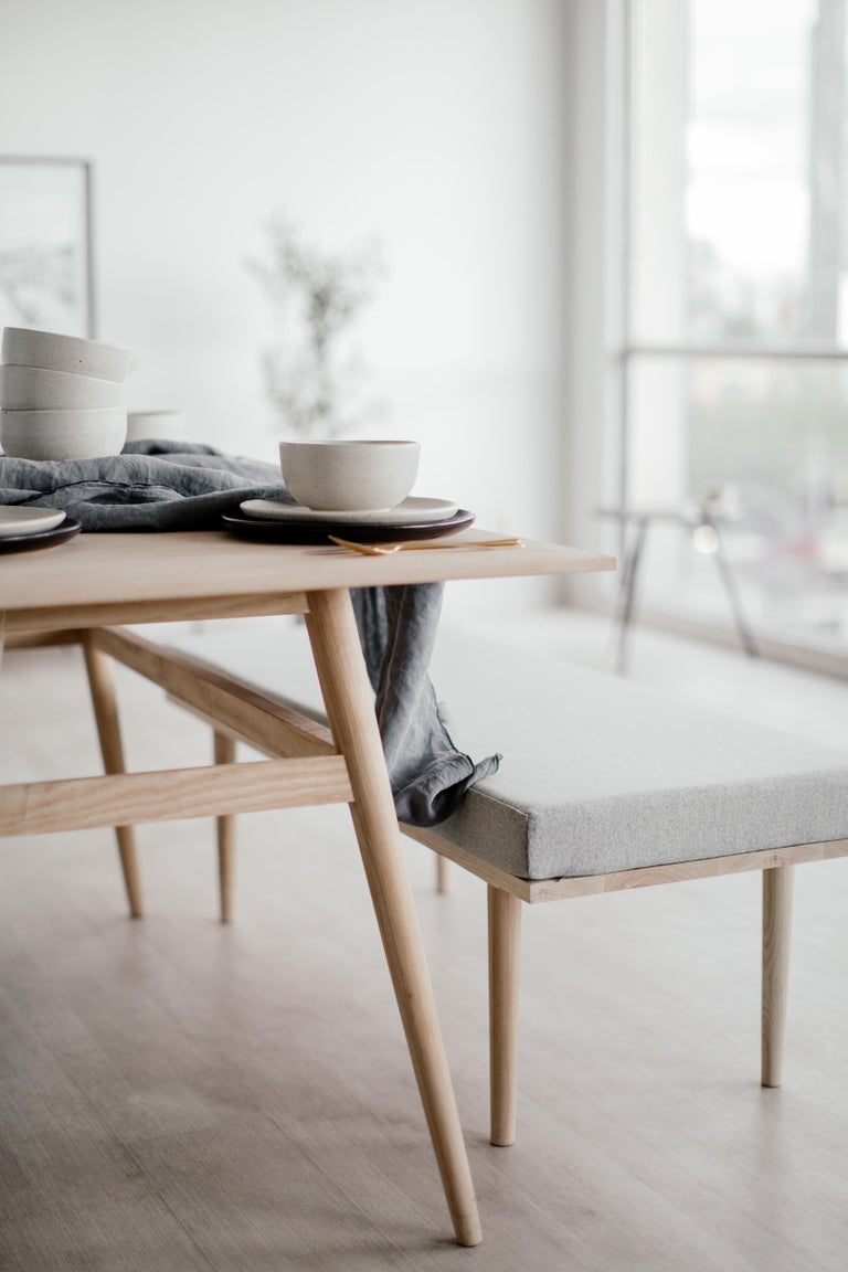 The Fresno Bench emphasizes comfort with the warm materials of solid wood and wool. The bench is versatile in use since it can adapt to any space. It promotes conviviality and simplicity to create an atmosphere of well-being.  Production time: 6-8