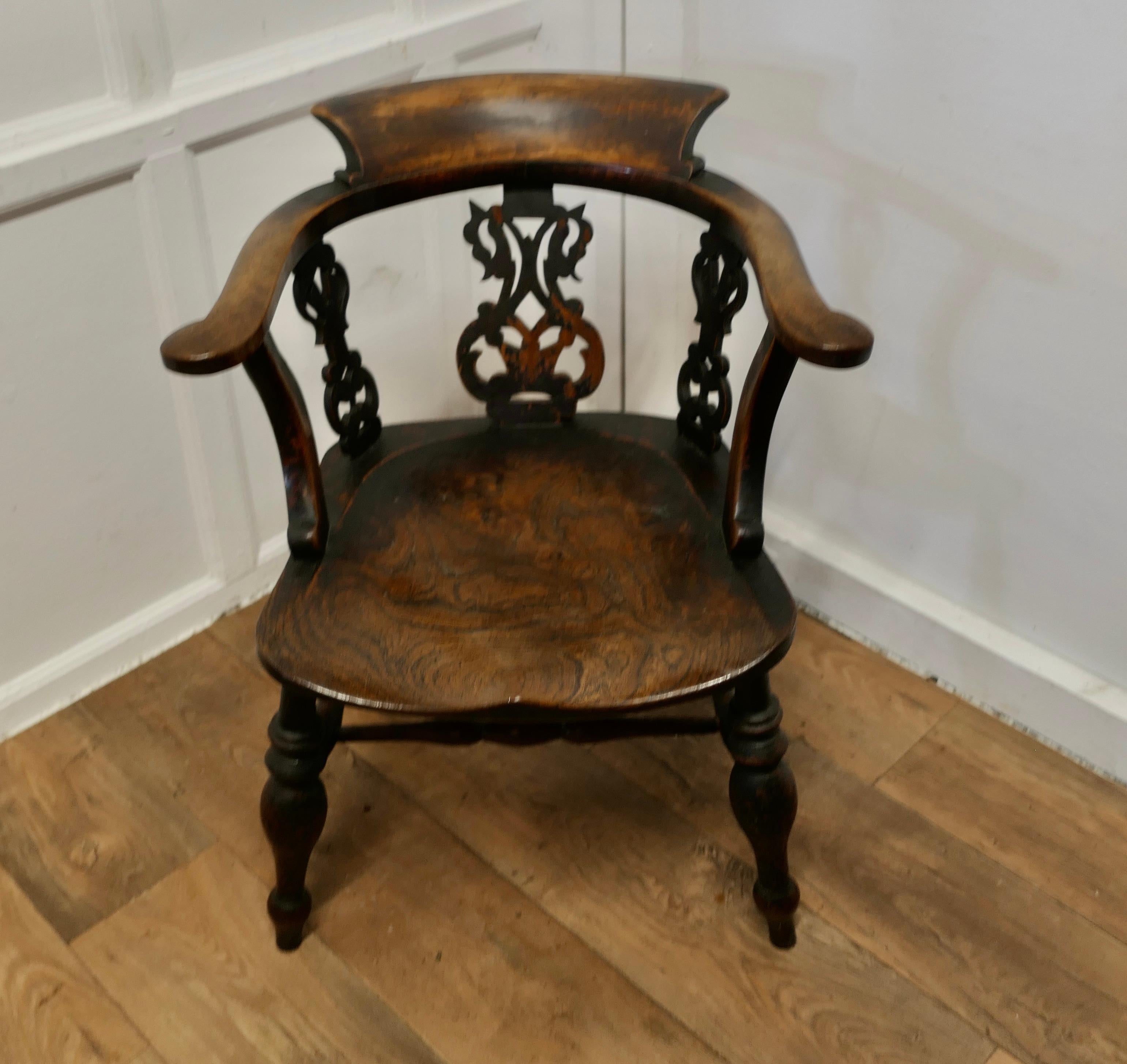 Fretwork Back Elm Windsor Desk Chair 

This style is known by many names Smokers Bow, Windsor Chair  or Captain’s Chair 

A good original English Elm Windsor Carver Chair, all in very good original condition with a natural patina.
The Chair has a