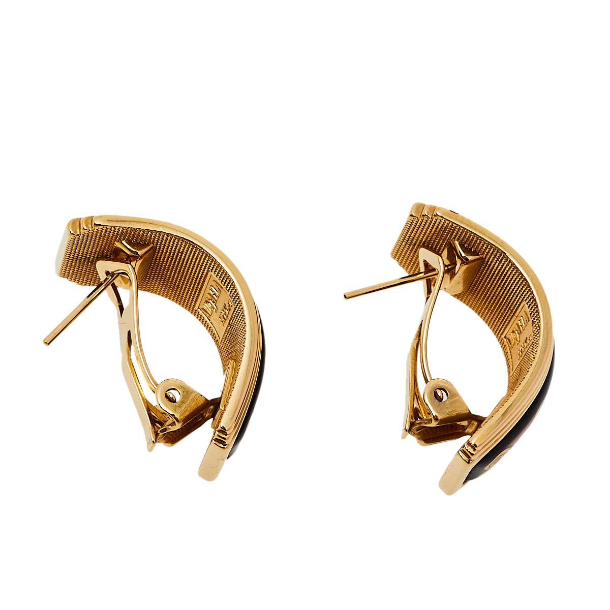 Frey Wille’s earrings are designed with a lot of thought and have a deep-rooted design philosophy. This pair in gold-plated metal is embellished with multicolored fire enamel all over the surface. Style your looks with this meaningful and minimalist