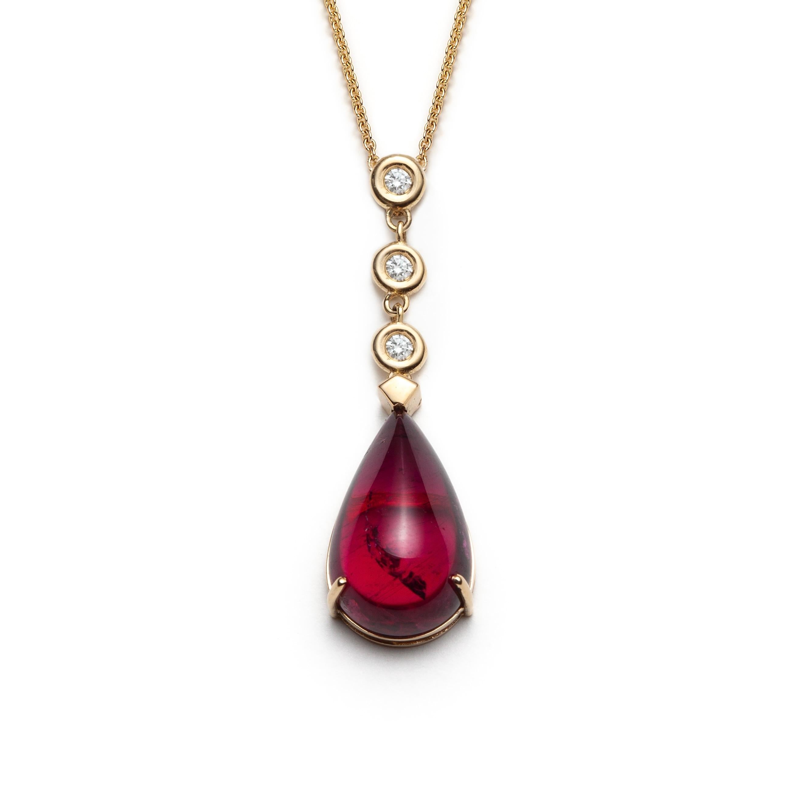 The Freya necklace features a teardrop rubellite (red tourmaline) cabochon set in 18k yellow gold enhanced by starry diamonds. The pendant glides freely on the 18” (45cm) chain.

The FREYA necklace celebrates the passion that animates our lives.
It