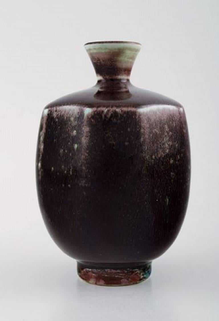 Friberg studio hand ceramic vase, unique.
Aniara glaze.
Signed.
Perfect. 1st. assortment.
Measures: 10 cm. x 6 cm.