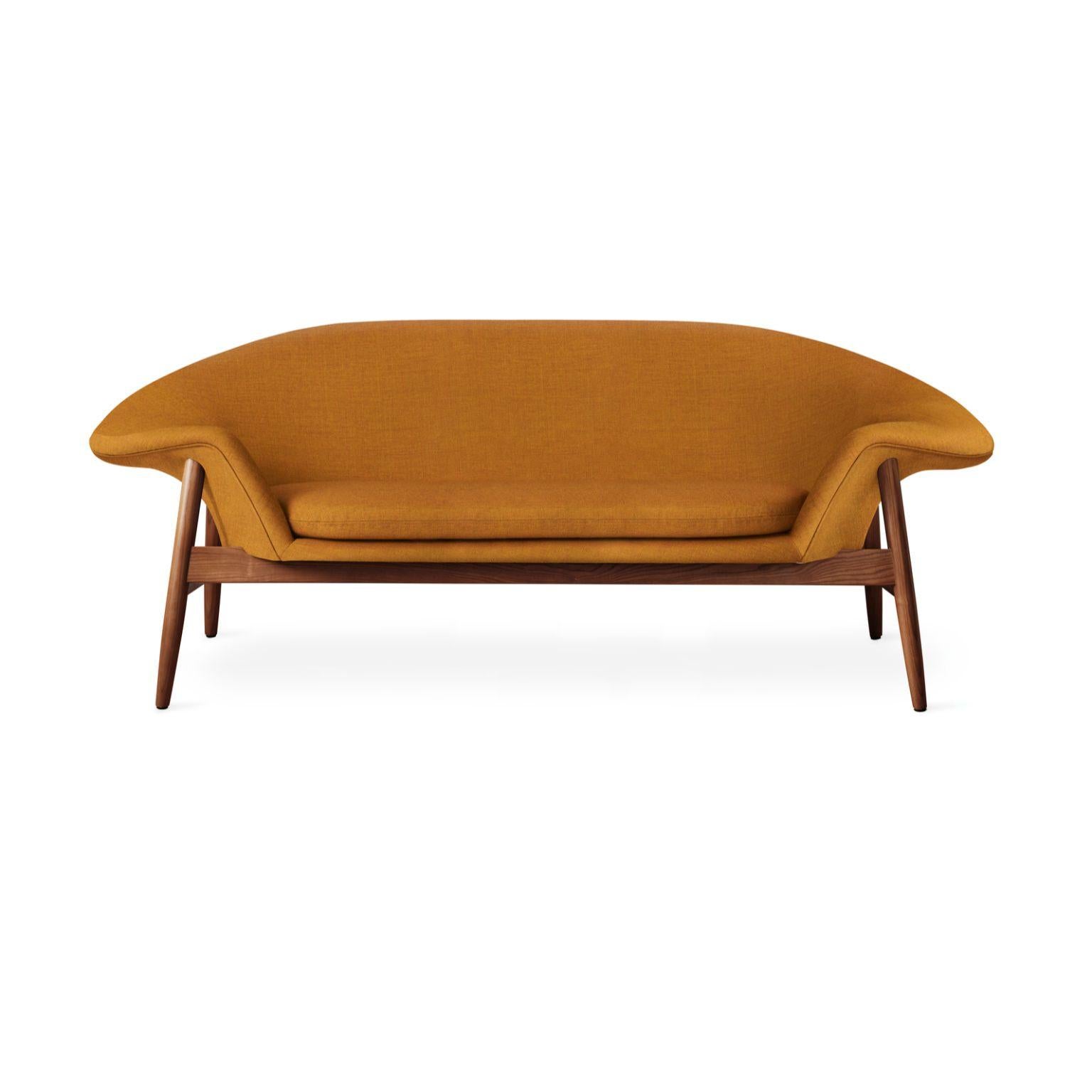 Fried egg sofa dark ochre by Warm Nordic
Dimensions: D 186 x W 68 x H 68 cm
Material: Textile upholstery, Solid oiled teak
Weight: 42 kg
Also available in different colours and finishes.

Warm Nordic is an ambitious design brand anchored in