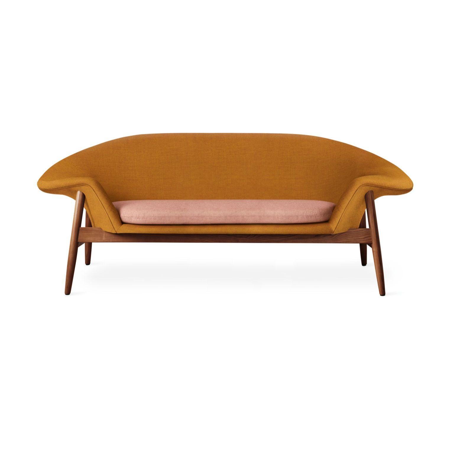 Fried egg sofa dark ochre pale rose by Warm Nordic
Dimensions: D 186 x W 68 x H 68 cm
Material: Textile upholstery, Solid oiled teak
Weight: 42 kg
Also available in different colours and finishes.

Warm Nordic is an ambitious design brand