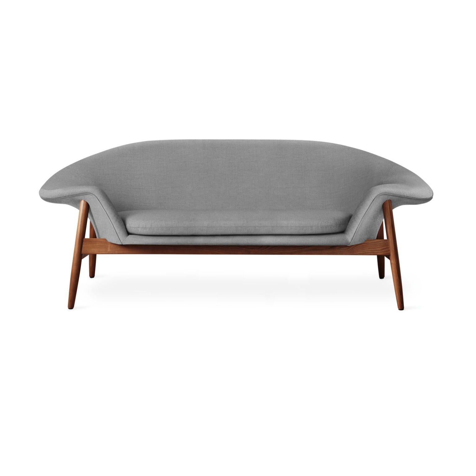 Fried egg sofa grey Melange by Warm Nordic
Dimensions: D186 x W68 x H 68 cm
Material: Textile upholstery, Solid oiled teak
Weight: 42 kg
Also available in different colours and finishes. 

Warm Nordic is an ambitious design brand anchored in
