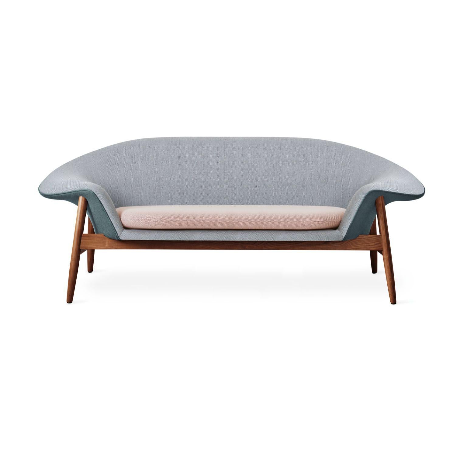 Fried Egg sofa light green petrol pale peach by Warm Nordic
Dimensions: D 186 x W 68 x H 68 cm
Material: Textile upholstery, Solid oiled teak
Weight: 42 kg
Also available in different colours and finishes.

Warm Nordic is an ambitious design