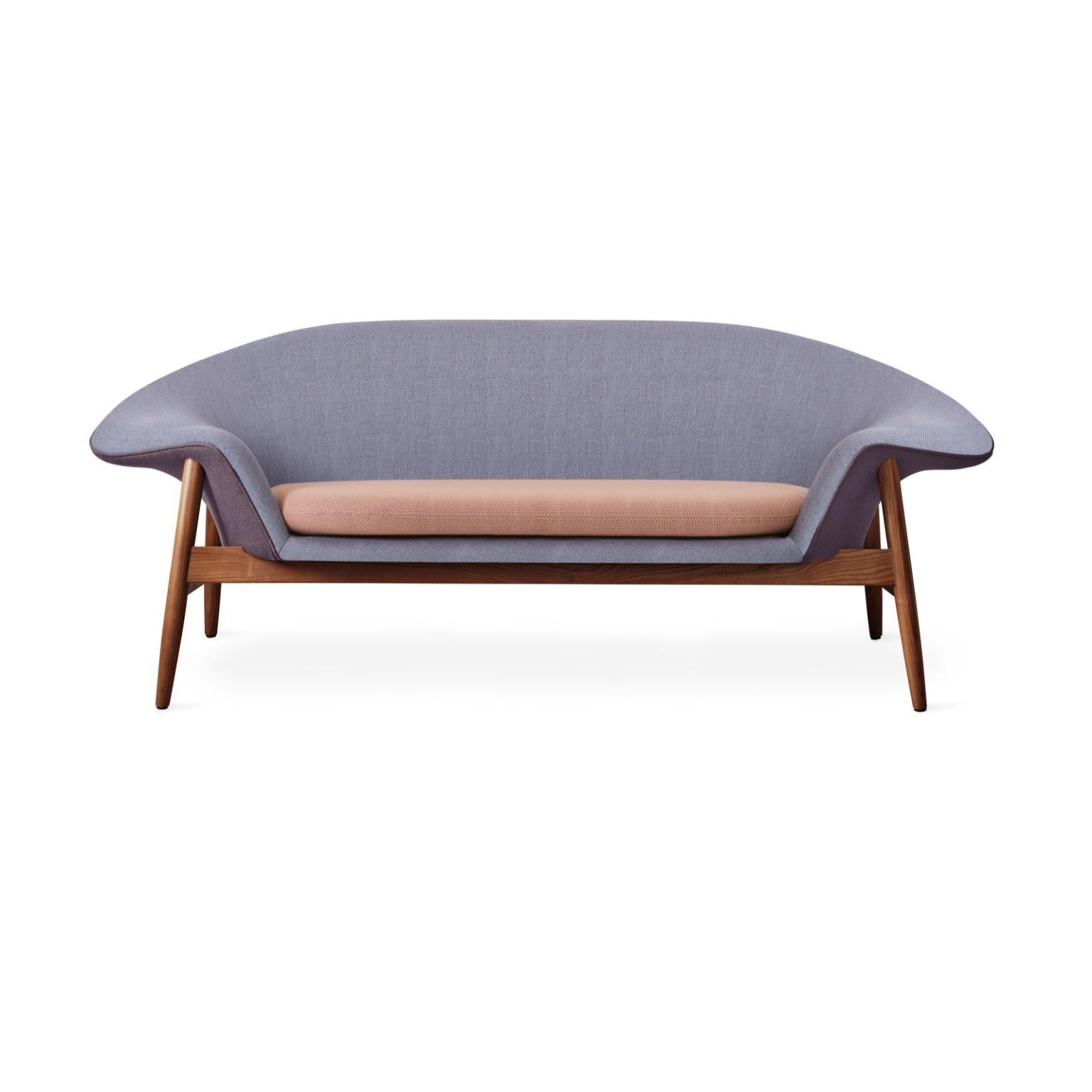 Fried egg sofa soft violet plum fresh peach by Warm Nordic
Dimensions: D 186 x W 68 x H 68 cm
Material: Textile upholstery, Solid oiled teak
Weight: 42 kg
Also available in different colours and finishes.

Warm Nordic is an ambitious design brand