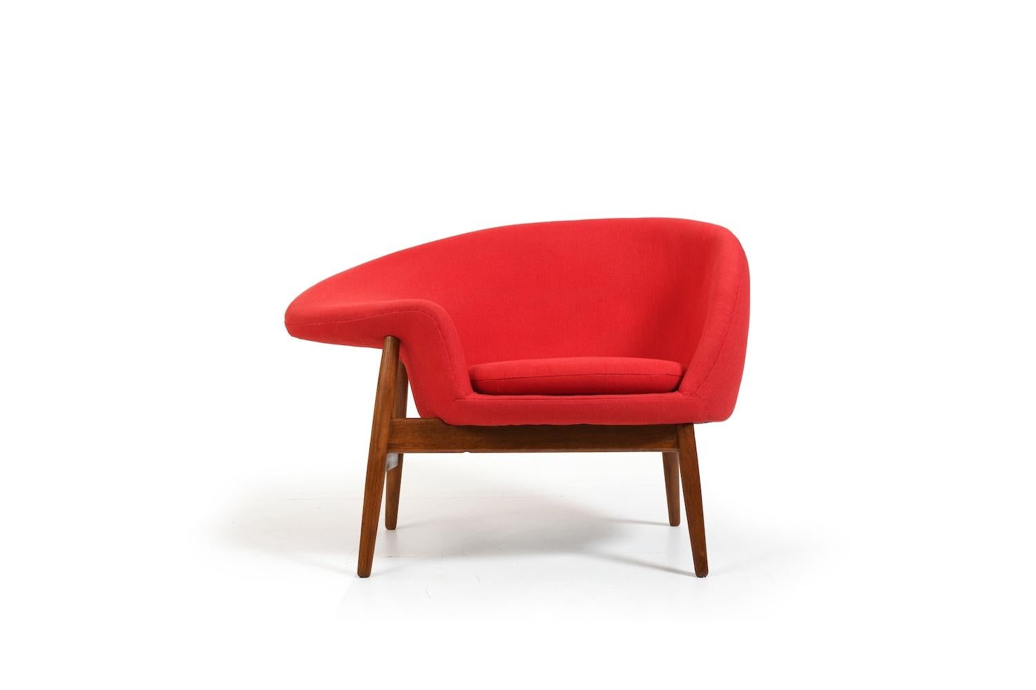 Old FRied Egg easychai by Hans Olsen for Bramin Denmark 1956. Produced 1950s in solid teak. Old versiion with screws. Later reupholstered in a red wool fabric from Kvadrat. This work was carried out by the renowned Danish upholsterer Knud B.