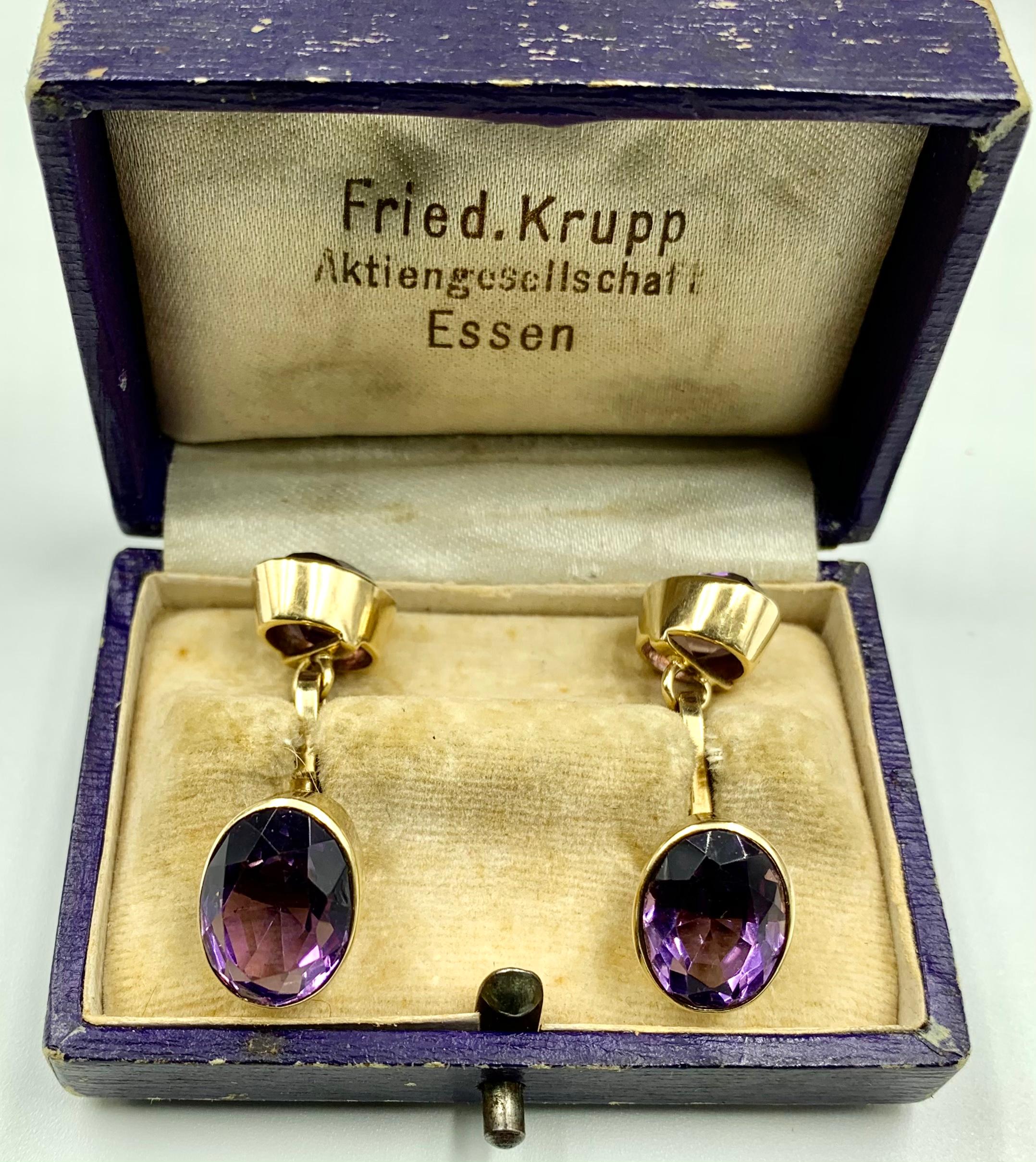 Large faceted octagonal cut oval amethyst 14 karat yellow gold cufflinks with original case marked Fried Krupp Aktiengesellschaf Essen. Substantial gold setting, the four stones measuring 13mm by 9mm, the largest to 11mm by 8mm, the