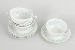 Friedl Holzer-Kjellberg, Arabia. 4 porcelain tea cups & saucers. Rice pattern