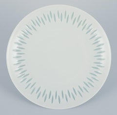 Friedl Holzer-Kjellberg for Arabia. Eight plates in rice porcelain. Ca 1970