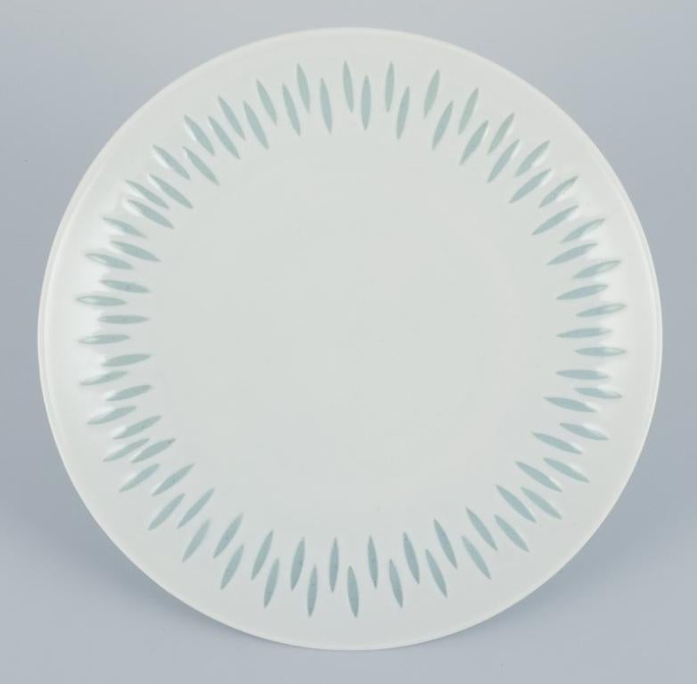 Friedl Holzer-Kjellberg for Arabia, Finland.
Eight plates in rice porcelain.
Approximately from the 1970s.
Perfect condition.
Marked.
Dimensions: 19.0 cm.