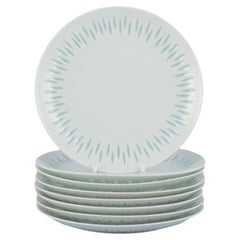 Friedl Holzer-Kjellberg for Arabia, Finland. Eight plates in rice porcelain.
