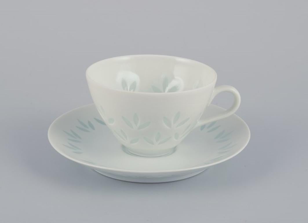 Friedl Kjellberg for Arabia, Finland. 
A set of four coffee cups with matching saucers in rice porcelain.
Approximately from the 1960s.
Marked.
In perfect condition.
Cup: Diameter 7.0 cm x 4.5 cm.
Saucer: Diameter 11.2 cm.