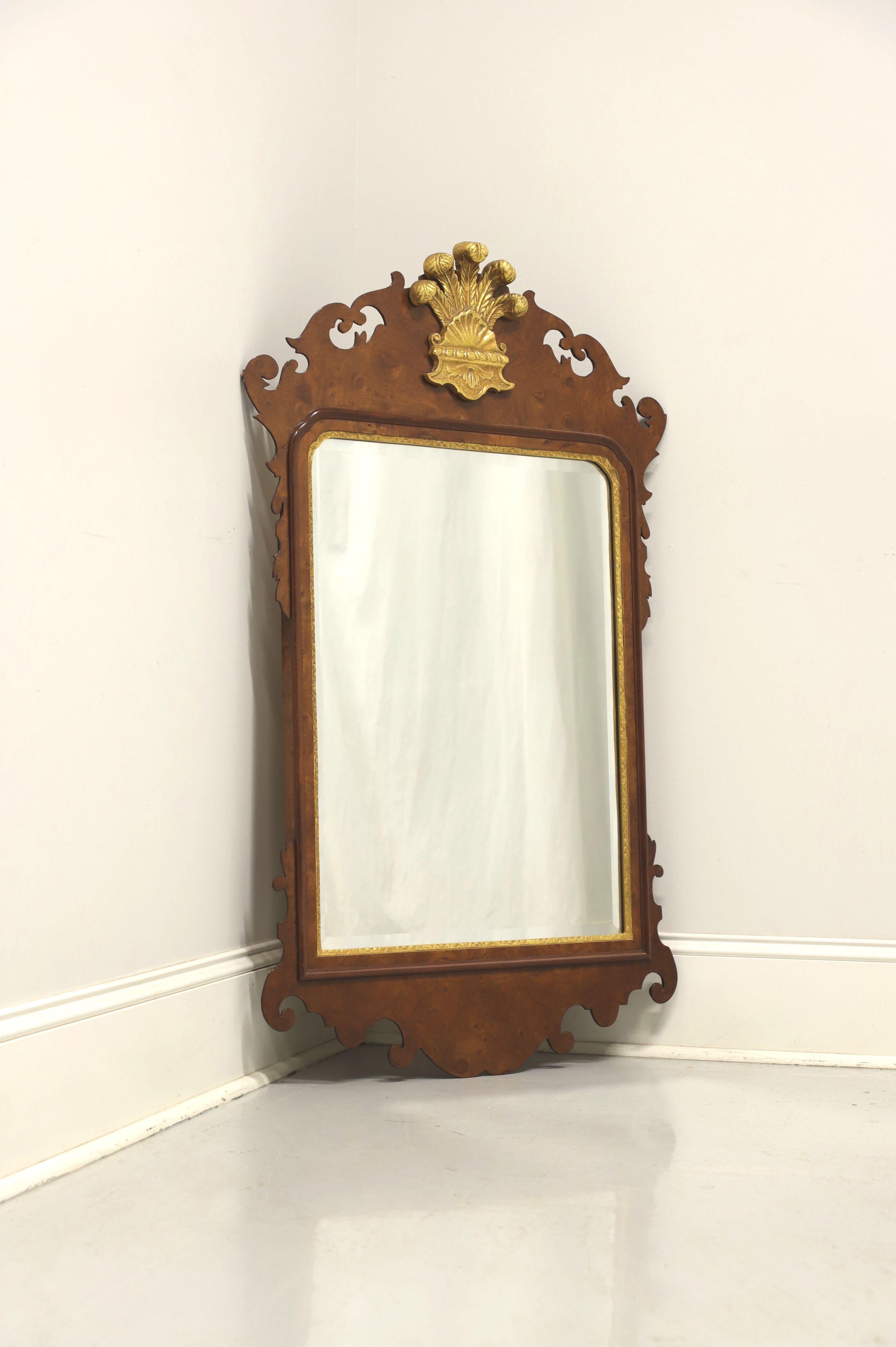 A Chippendale style wall mirror by Friedman Brothers, from their Colonial Williamsburg Collection. 