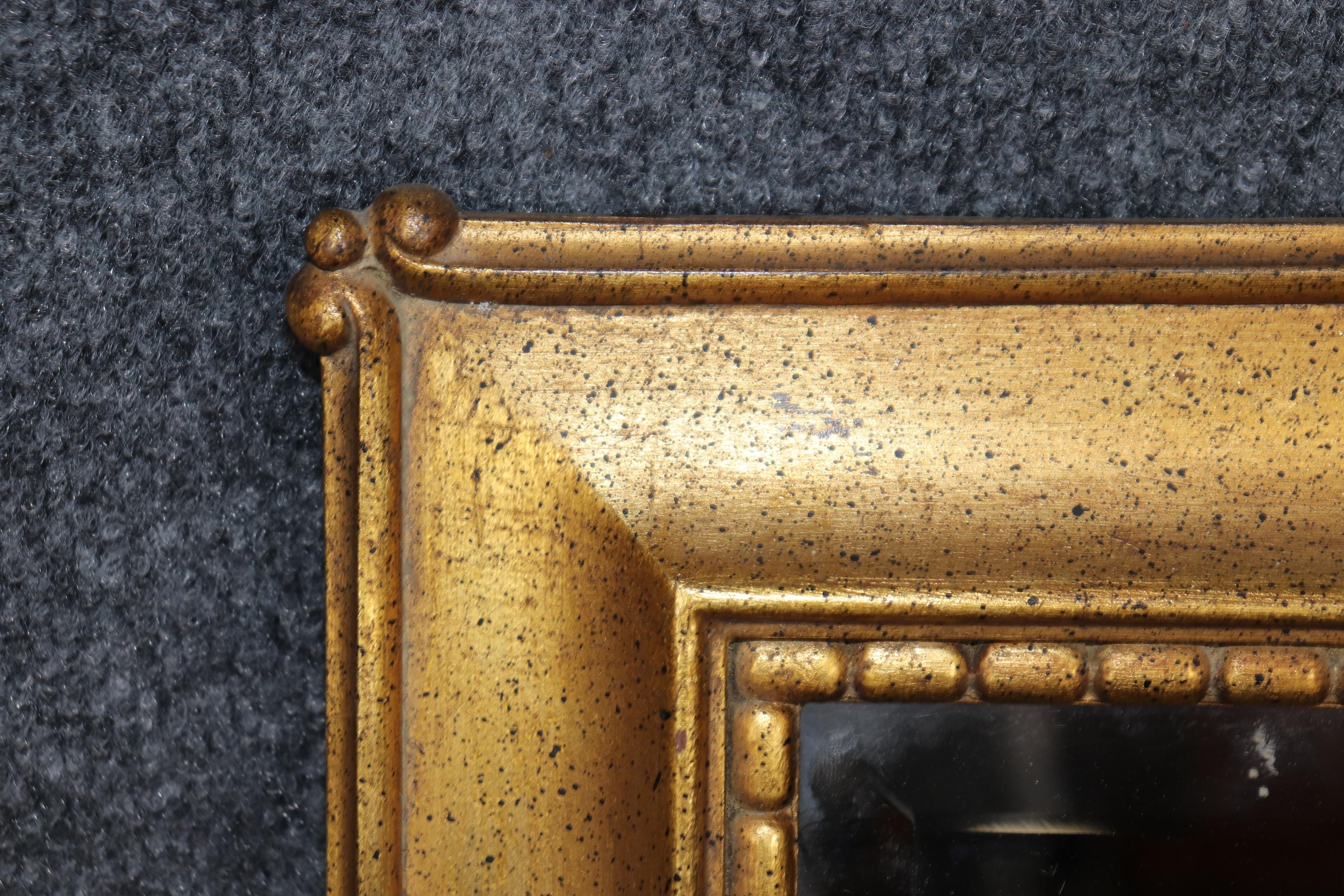Mid-20th Century Friedman Brothers Decorative Arts Draper Era Style Gold Mirror Shell Motif For Sale