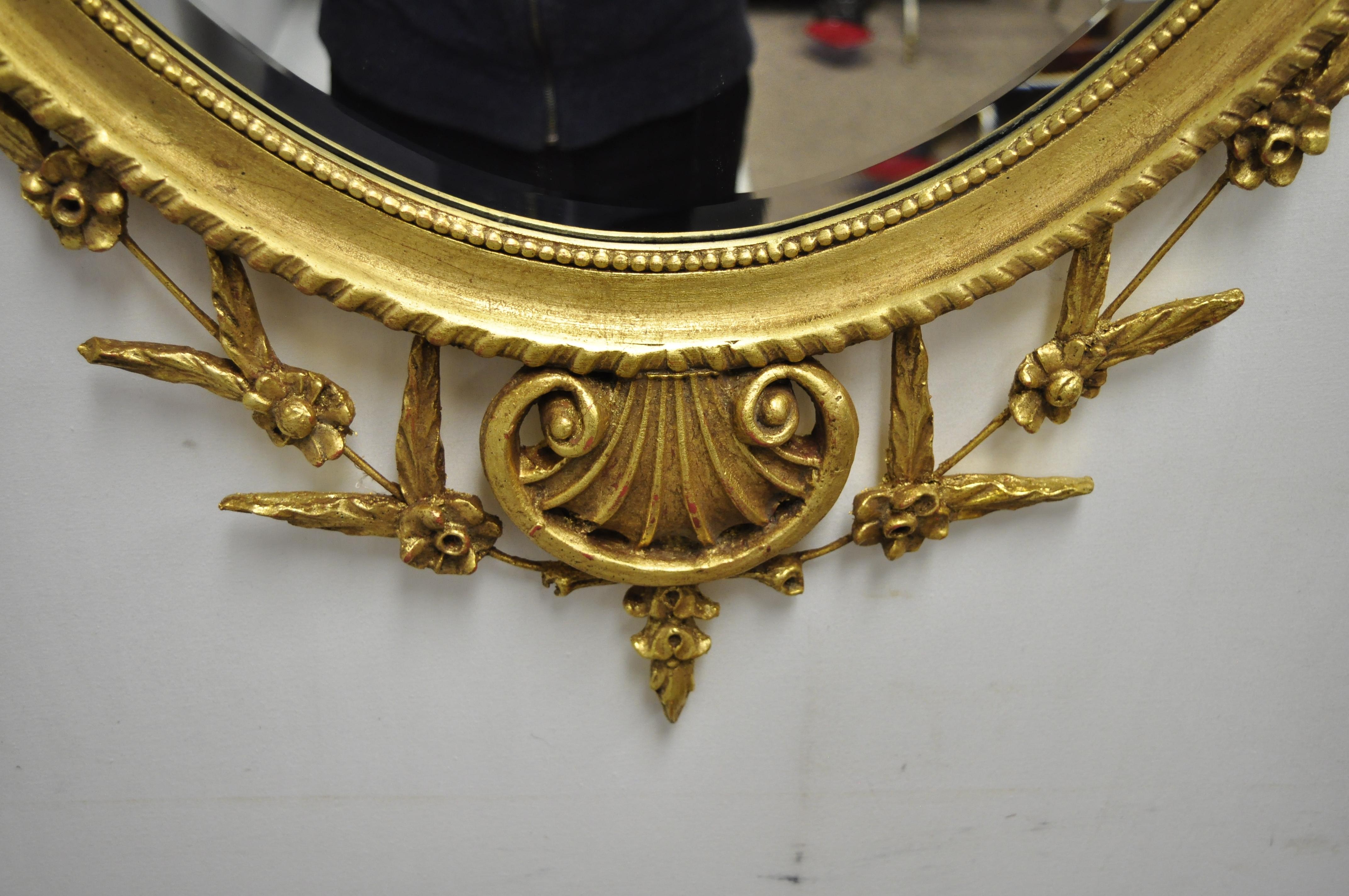 Friedman Brothers Large Oval Adams Style Gold Giltwood Wall Mirror In Good Condition For Sale In Philadelphia, PA
