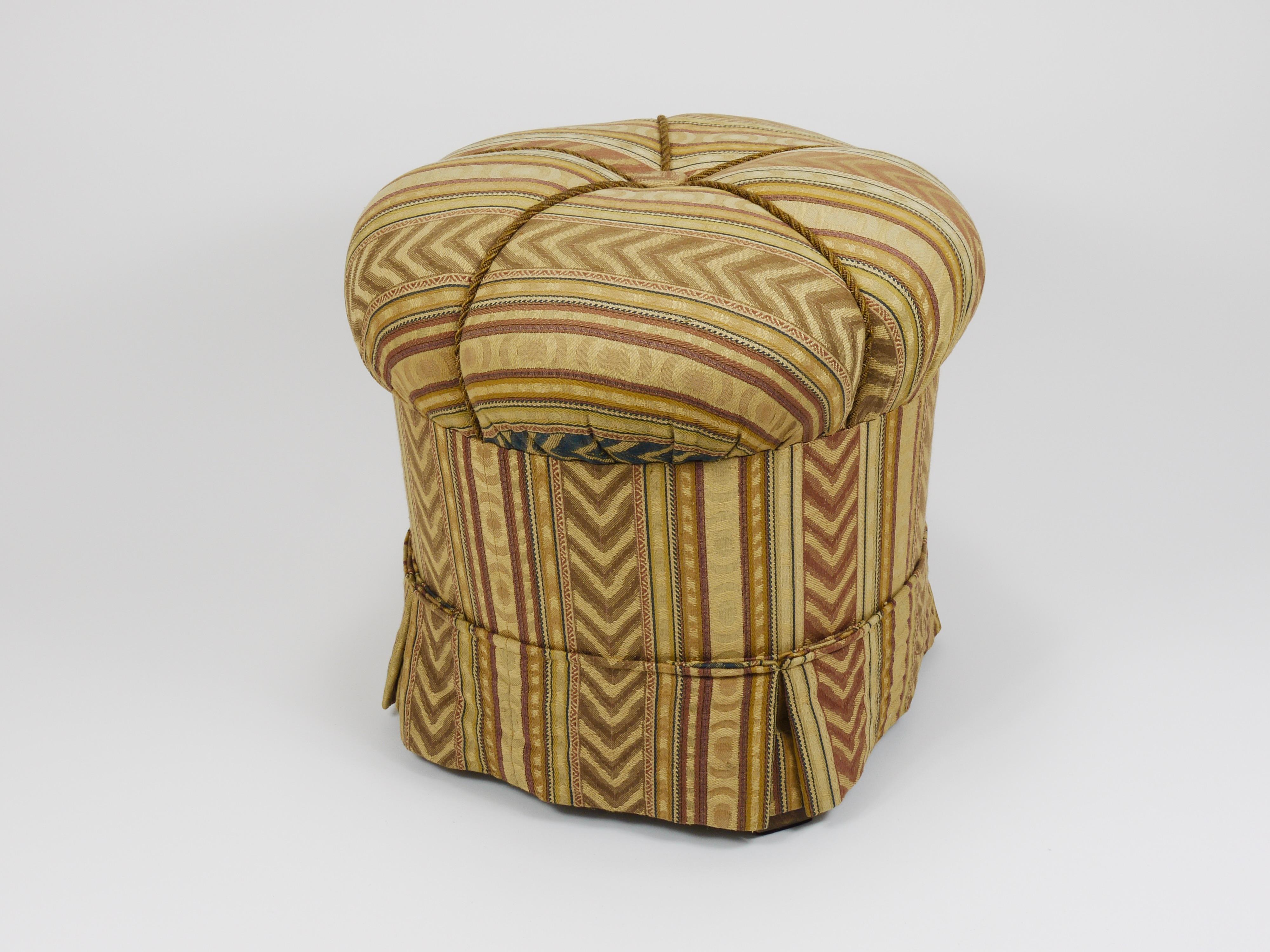 A beautiful Art Deco tabouret or stool / footstool, dating from around 1925. Manufactured by Friedrich Otto Schmidt, Vienna / Austria. The stool features an elegant round shape and impresses above all with its well-preserved condition. It is still