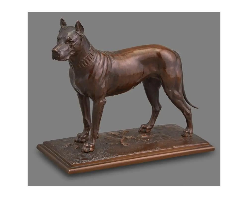 Friedrich Ruckart 
German,1832-1893 
Standing Doberman 
Signed Fried. Ruckart K. J.; inscribed Hampe Deutsche Dogge and indistinctly inscribed to the right of the signature on the base 
Bronze with brown patina 
Height 7 1/8 inches (18.1