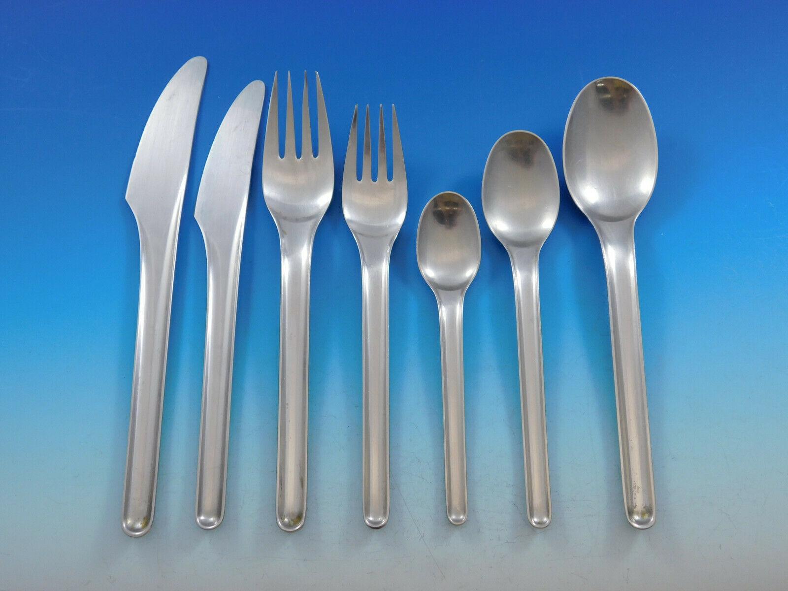 Frigast (Denmark) estate stainless steel modern design flatware set, 42 pieces. This set features elongated, unadorned handles and includes:

6 dinner knives, 8 1/4