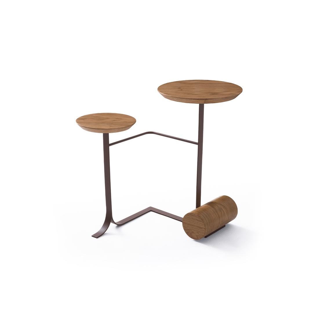 The Frigga side table is Inspired by the tales and beliefs of Norse mythology.
The features of the Frigga refer to contemporaneity and functionality.

Its design is unusual and unites two materials: carbon steel with brass color paint finish and