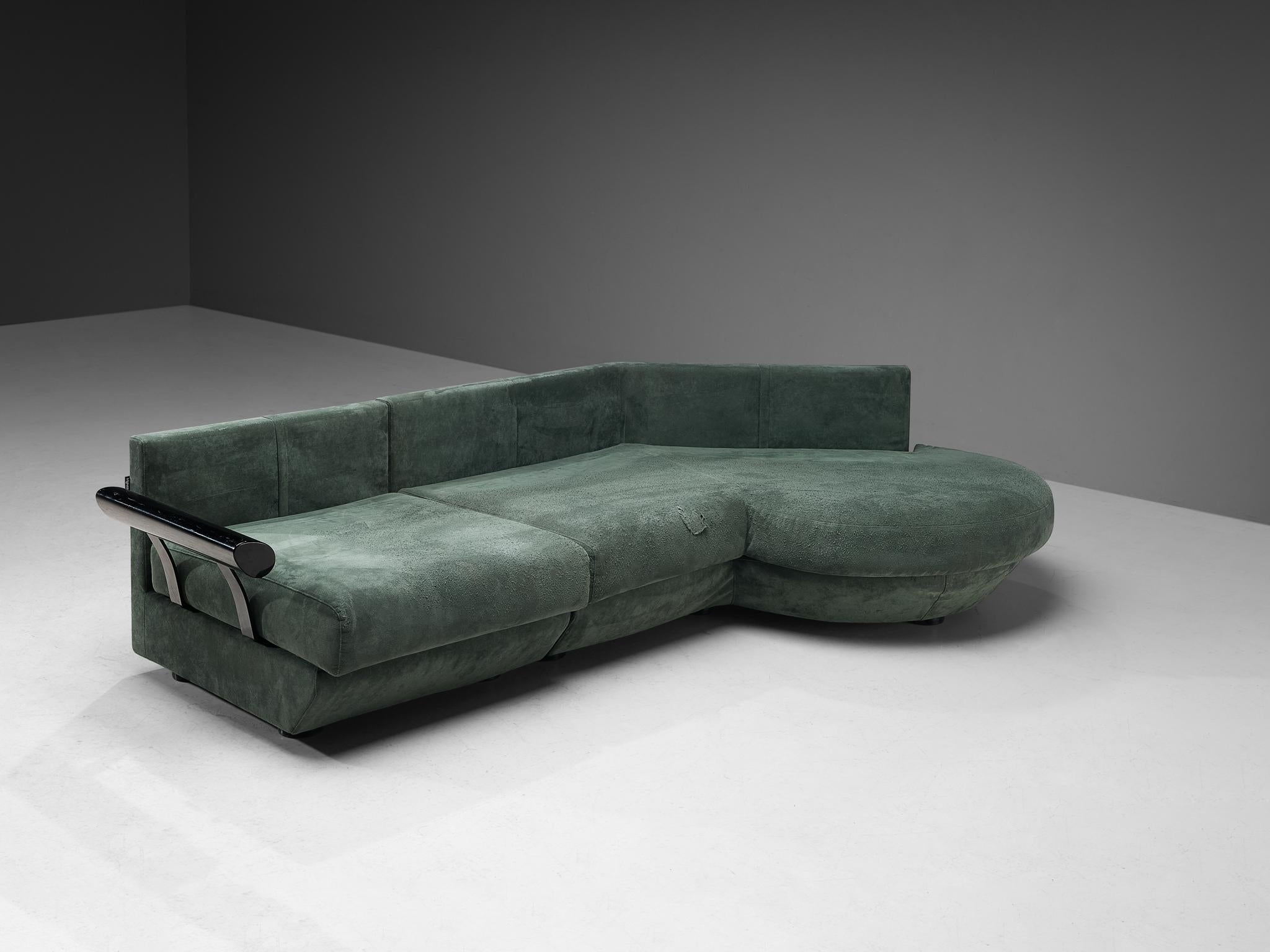 Frighetto, sectional sofa, alcantara / ultrasuede, plastic, coated metal, Italy, 1980s 

Beautiful Italian sofa in soft green upholstery that embraces the sensuous curves. Due to the organic shape and the strict angles of the back, the sofa gets a