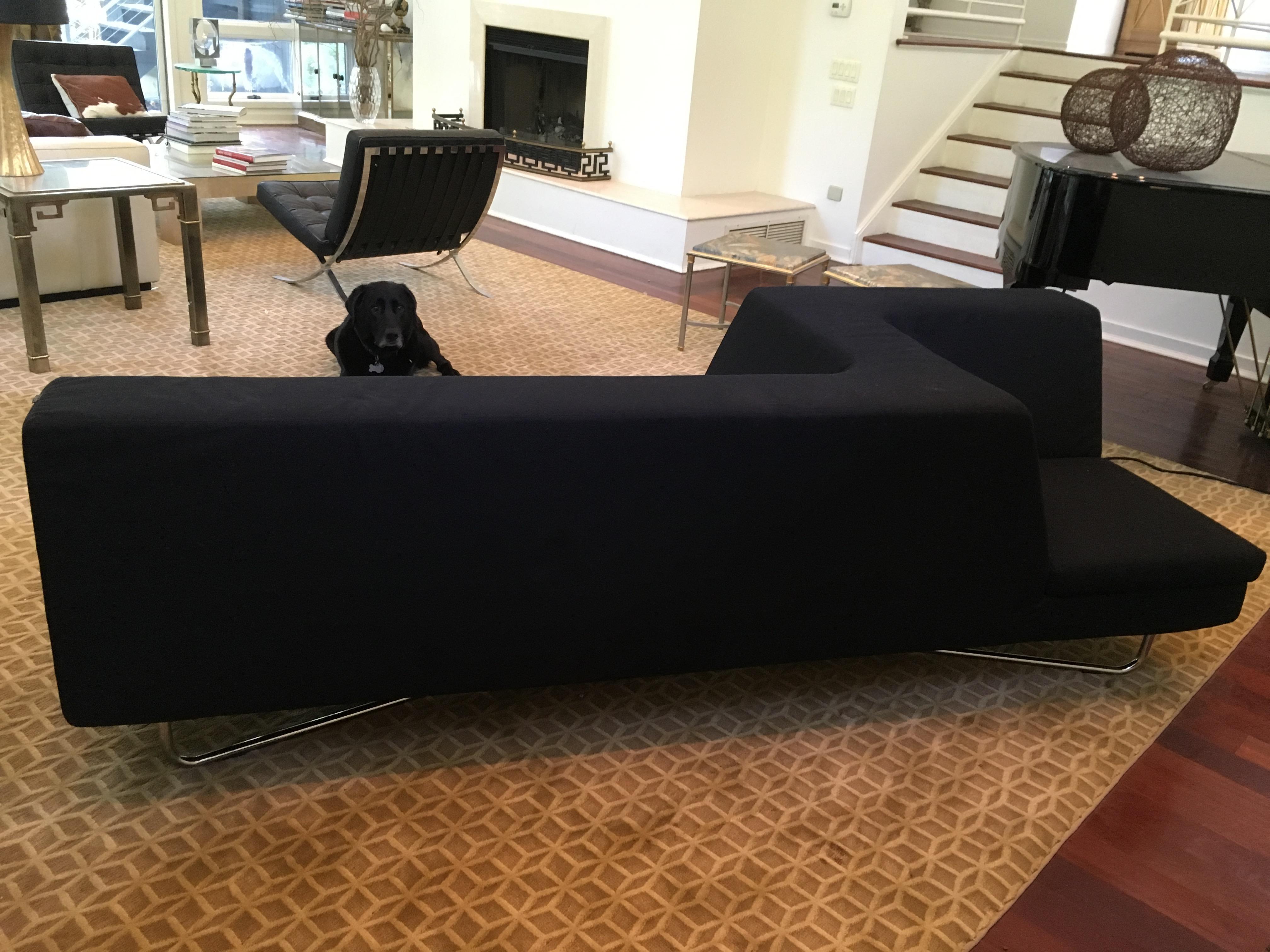 Frighetto Victory sofa by Cory Grosser. Black fabric, vice versa seating configuration. Chrome base. From a Greenwich, Connecticut mansion.