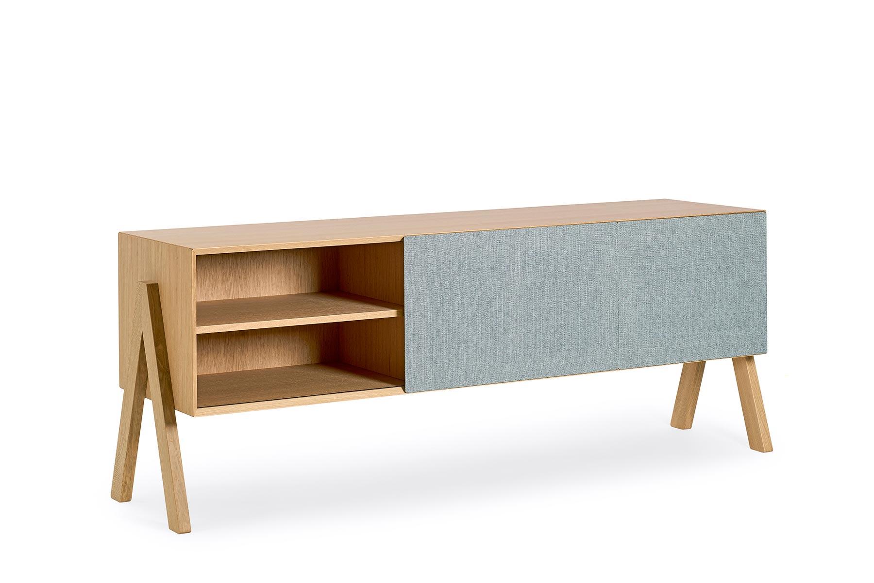 Designed by Friis and Moltke in 2017, this minimalist’s credenza features exterior mounted V- legs with a cloth cabinet door that slides from one bay to the next. Crafted in solid wood, this credenza is hand built at Getama’s factory in Gedsted,