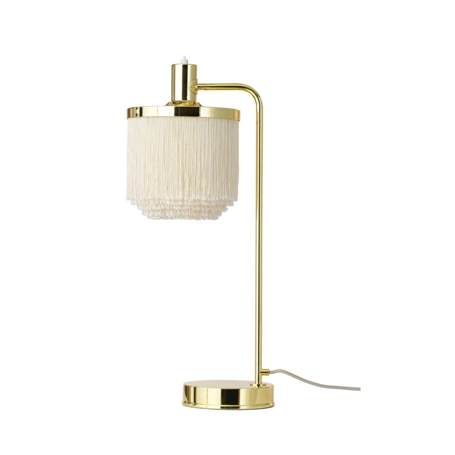 Fringe cream white table lamp by Warm Nordic
Dimensions: D 20 x W 26 x H 61 cm
Material: Brass plated steel, Viscose fringes
Weight: 1 kg
Also available in different colours.

An iconic table lamp with sophisticated fringes, created in 1960 by the