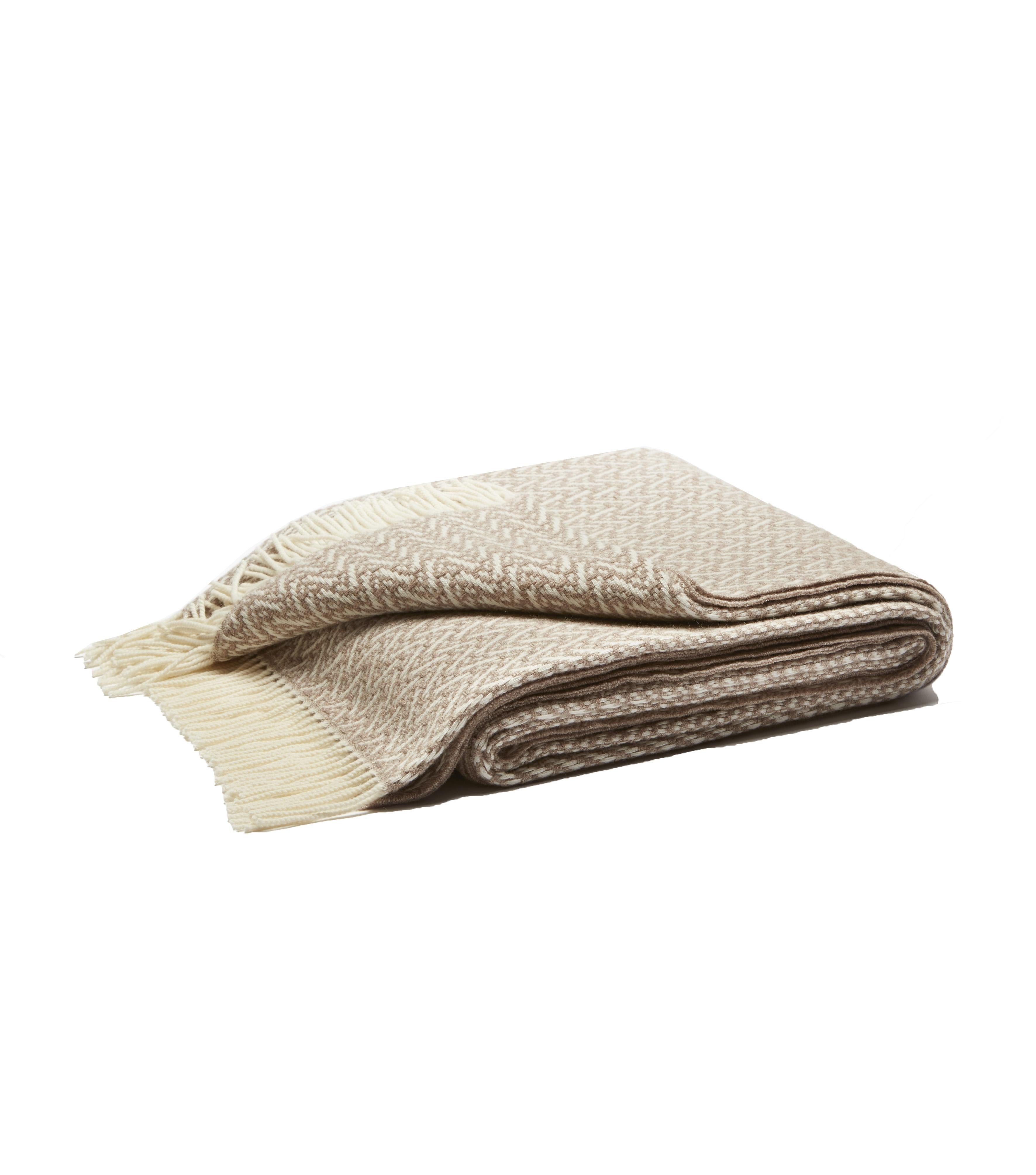 LO Decor Throws Collections showcase a contemporary take on a traditional design for a touch of timeless elegance. These generously sized Cashmere Throws give an aspirational edge to any living space. Stylish in its simplicity, this blanket is