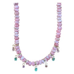 Fringe Rondelle Necklace with Rhodochrosite, Emeralds, Pink Spinel 
14k Gold