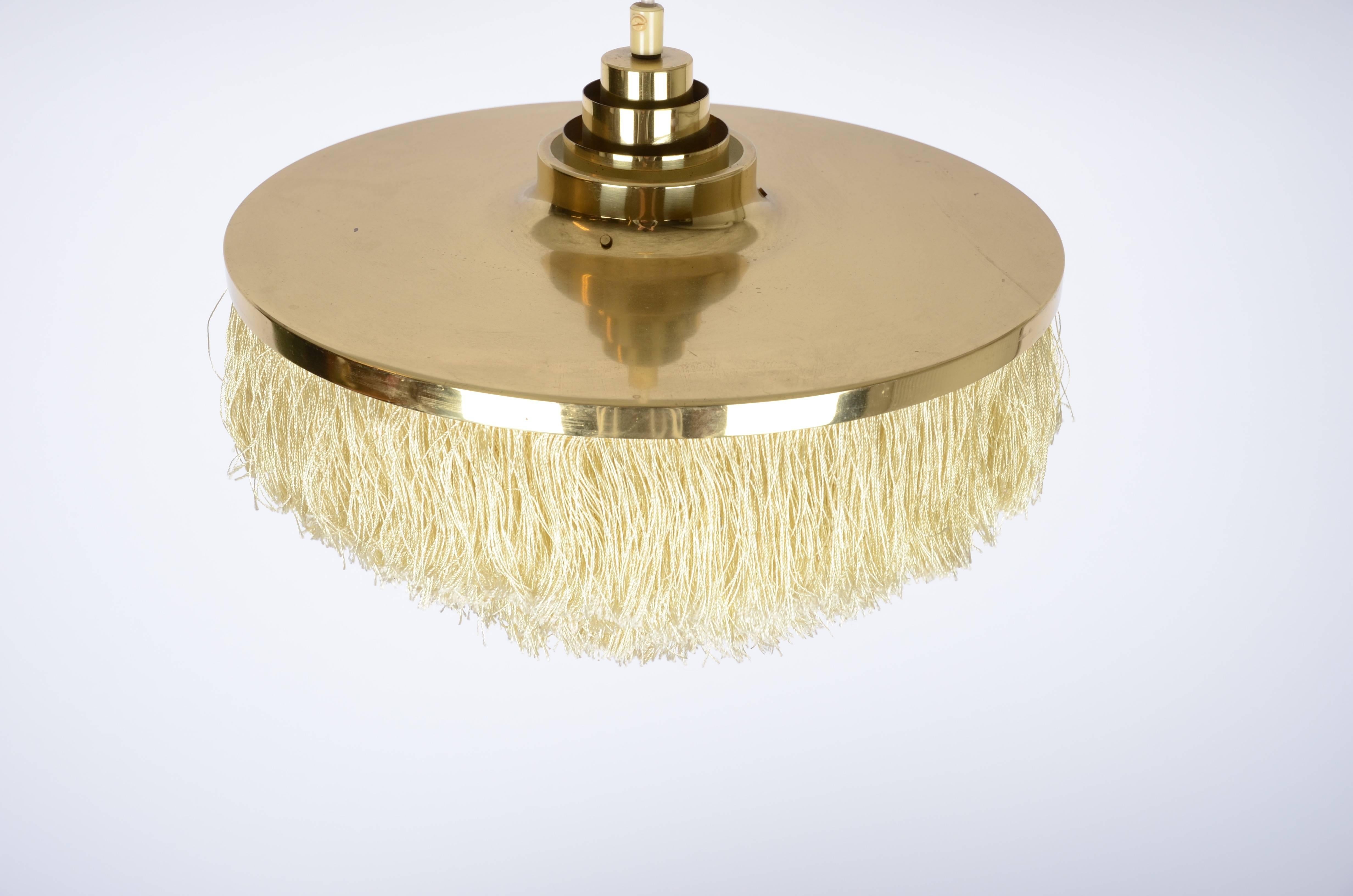 Brass pendant with silk fringe. Designed by Hans-Agne Jakobsson for Markaryd Sweden, 1960s.