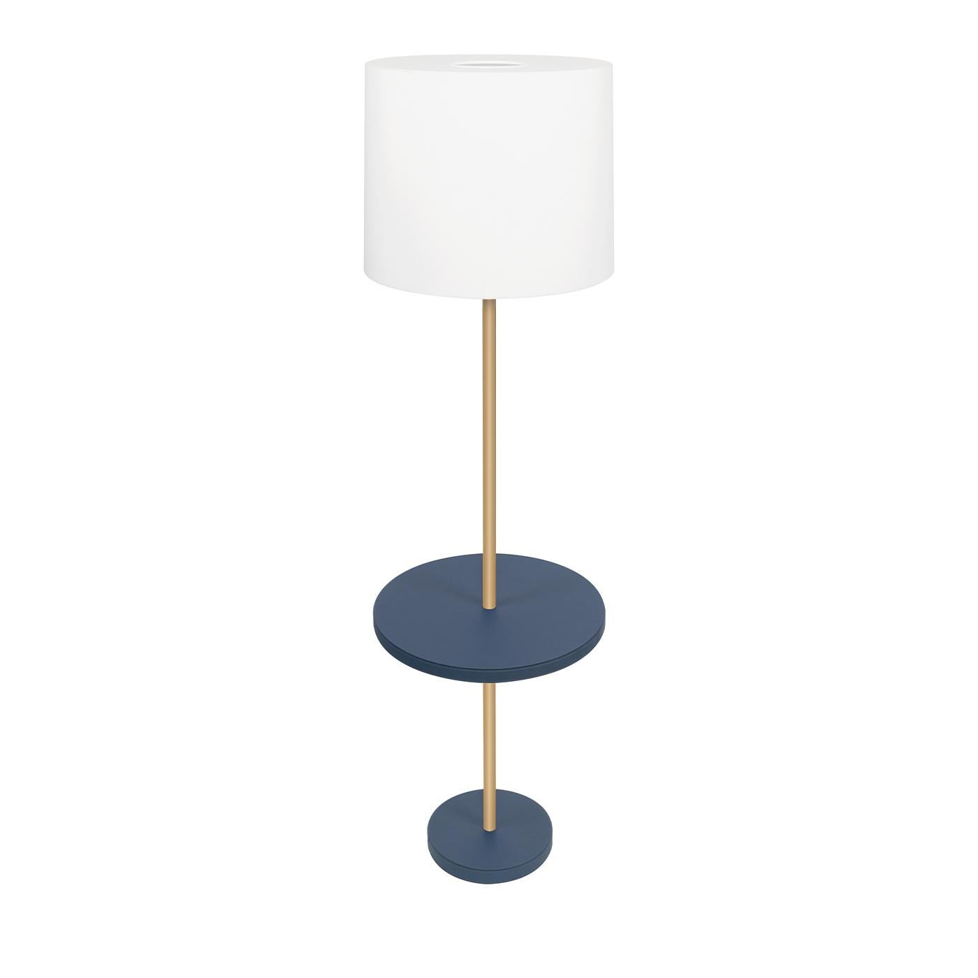 The Frisio floor lamp is an easy-on-the-eyes design that delivers a stylish way to light up a reading nook or entryway while adding extra functions along the way. Topped with a cylindrical white linen shade lined with a fireproof diffuser, the