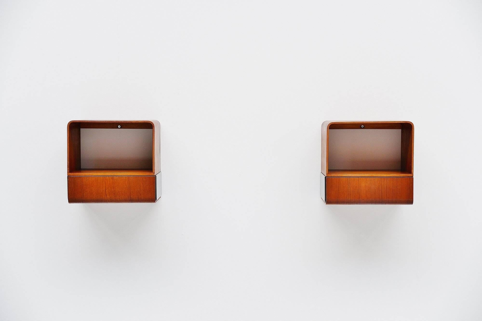 Very rare pair of bed cabinets designed by Friso Kramer for Auping, Holland 1963. These cabinets are from the Euroika series designed by Kramer in 1963. The Euroika series had a Bed, bed cabinets, table, chair, mirror and a toilet cabinet. All items
