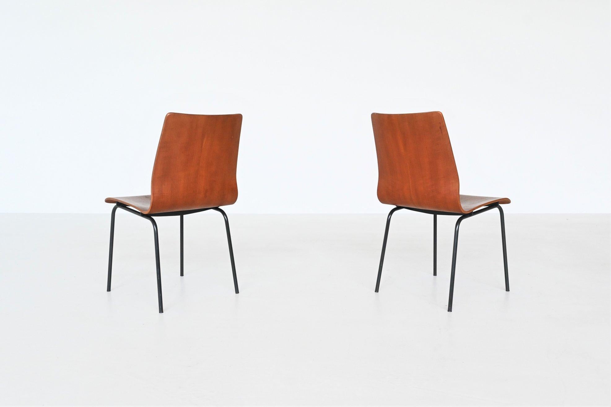 Beautiful shaped dining or side chairs from the Euroika series designed by Friso Kramer for Auping, The Netherlands 1963. Friso Kramer designed also from this series: bed, bed cabinets, table, chair, mirror and a toilet cabinet. These chairs have a