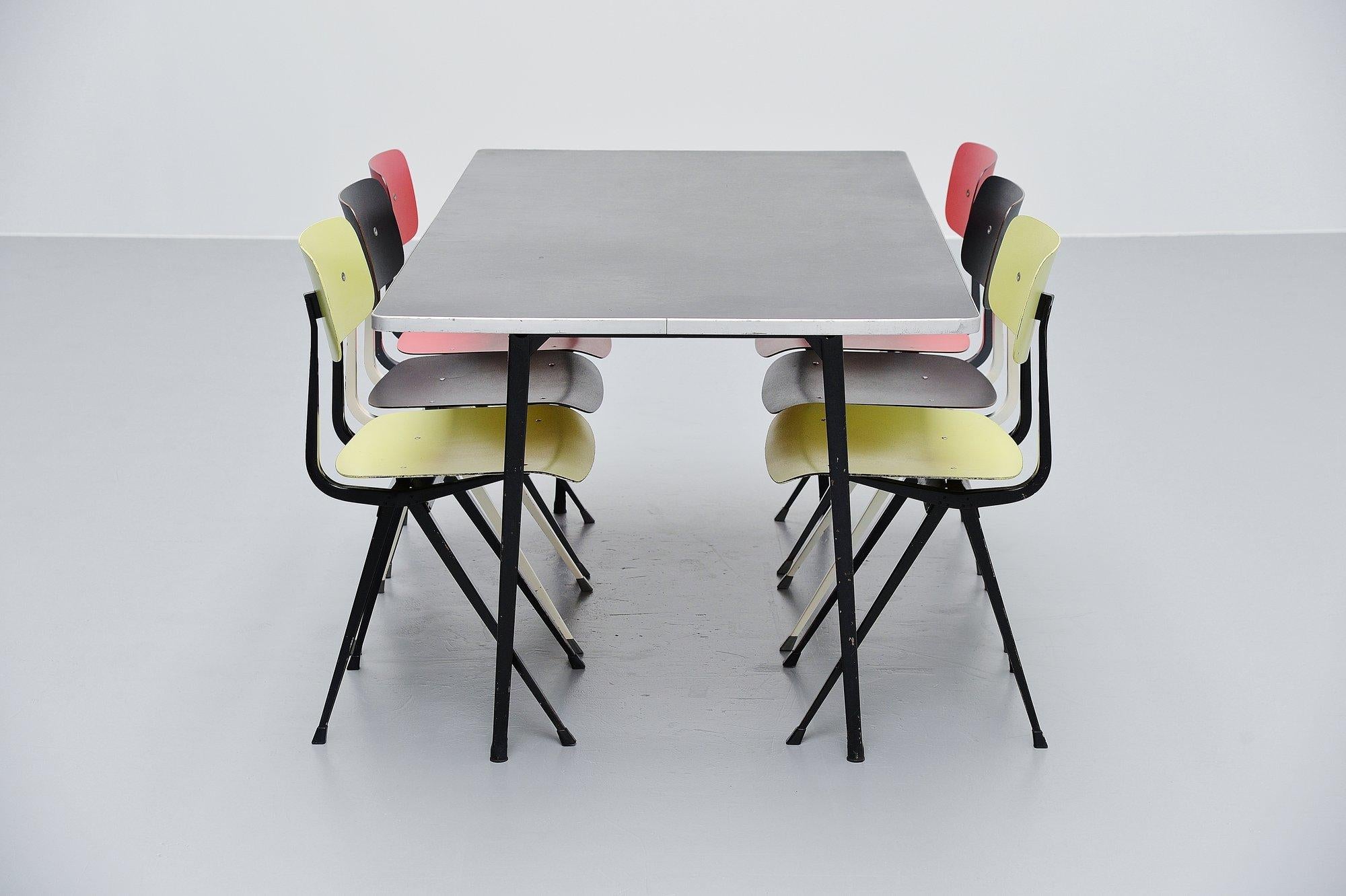 Nice medium sized industrial dining or working table designed by Friso Kramer for Ahrend de Cirkel, Holland 1955. This dining table was a part of the Reform table program that was designed by Friso Kramer in 1955. The Reform series contained a lot
