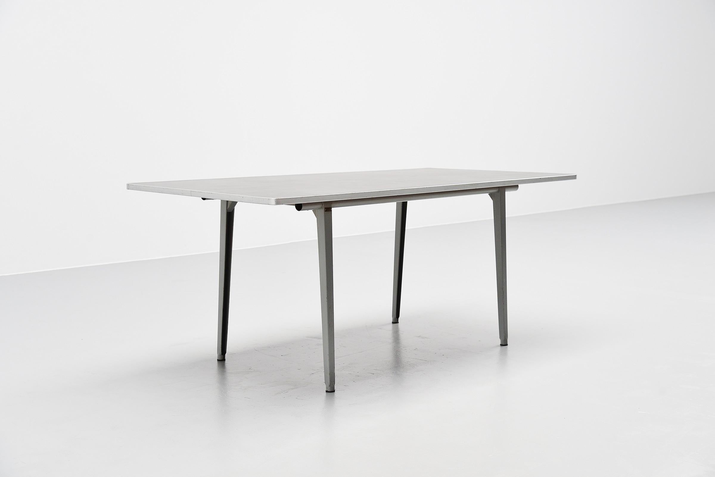 Nice medium and rare sized Industrial 'Reform' table designed by Friso Kramer for Ahrend de Cirkel, Holland 1955. This dining table was a part of the Reform table program that was designed by Friso Kramer in 1955. The Reform series contained a lot