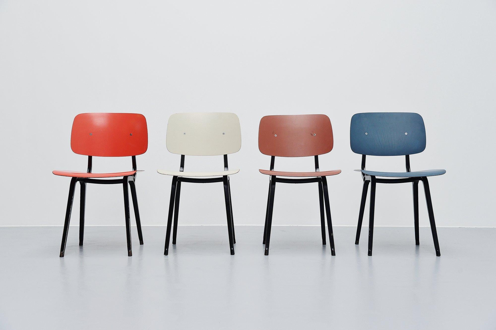Nice set of 4 Revolt chairs designed by Friso Kramer for Ahrend de Cirkel, Holland 1953. Though the Revolt chair was already designed in 1953, the production started in 1958. The chairs have a folded metal base which is very strong and a ciranol