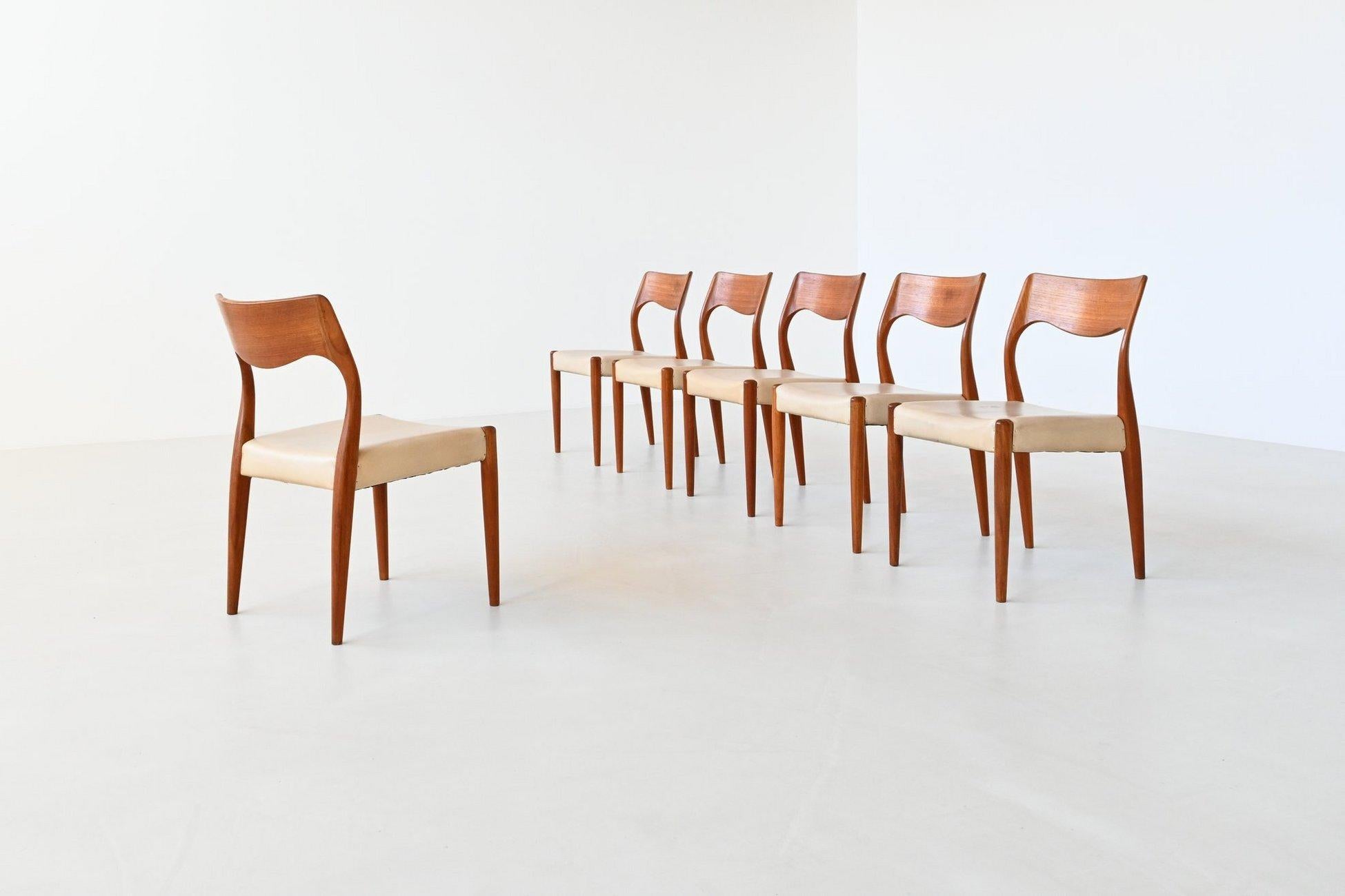 Beautiful set of six dining chairs manufactured by Fristho Franeker under license from J.L. Møller Møbelfabrik, The Netherlands 1954. These very nice elegant shaped chairs are made of solid teak wood and the seats are covered with original crème