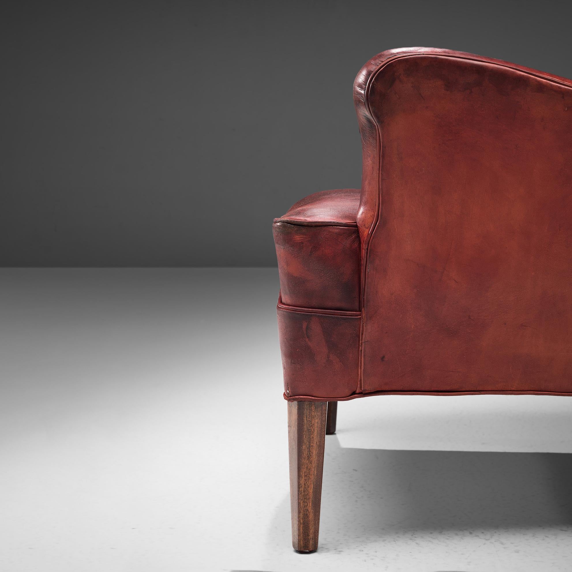 Mid-20th Century Frits Henningsen Lounge Chair with Ottoman in Original Burgundy Leather For Sale