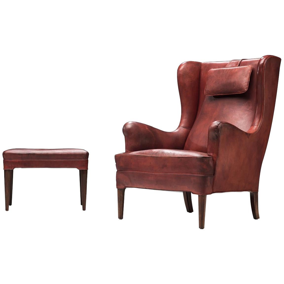 Frits Heningsen Lounge Chair with Ottoman in Original Burgundy Leather