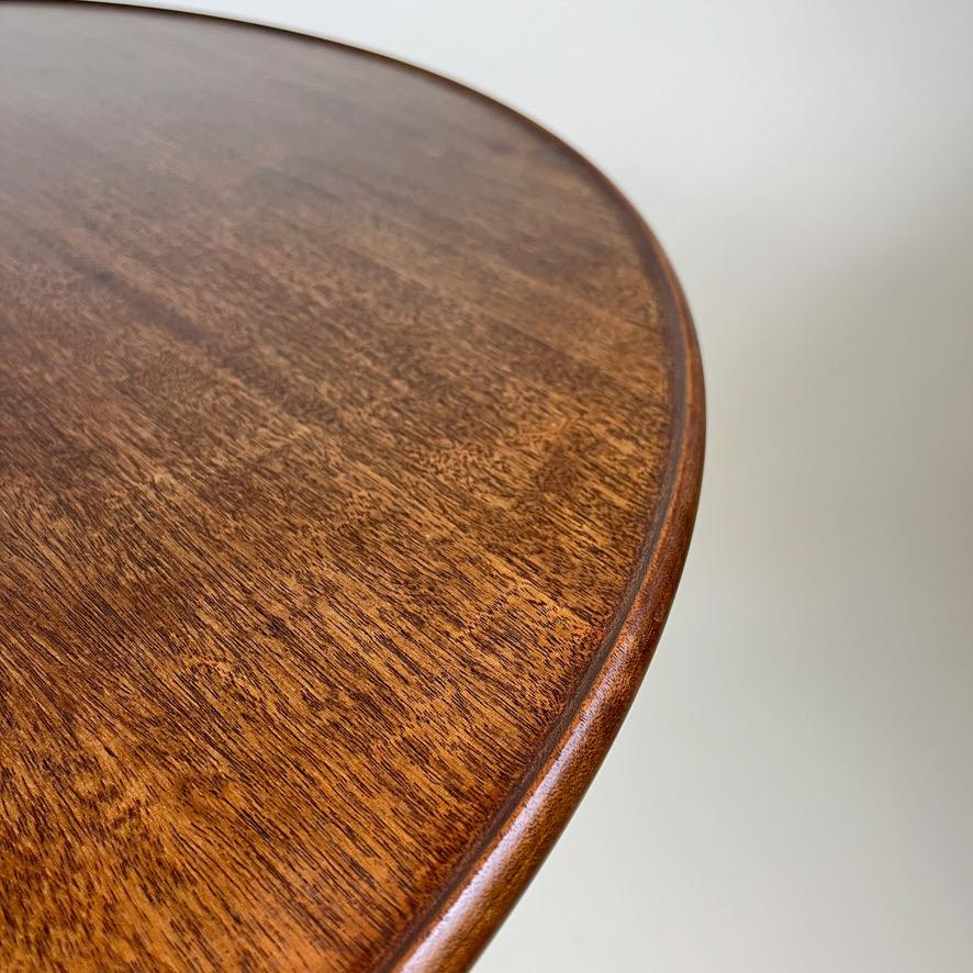 Danish Frits Henningsen. A Cuban mahogany circular pedestal  table. For Sale
